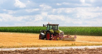 Tractor Plowing Field